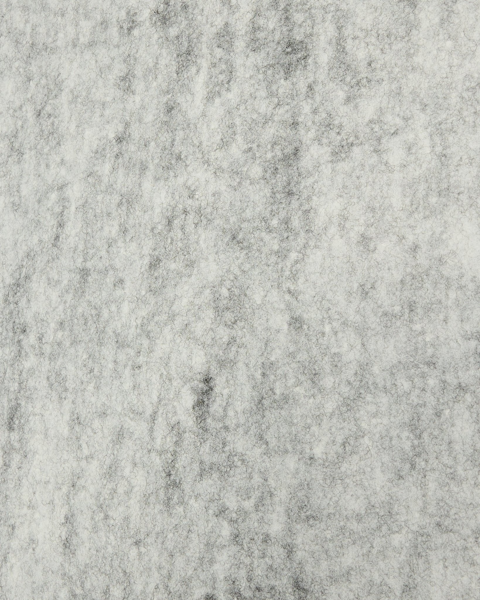 Detail of WoodUpp Akupanel installation accessory in grey felt, 240.1 x 59.8 cm, showing textured, marbled surface made from recycled plastic acoustic material.
